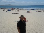 Man with hat on beach