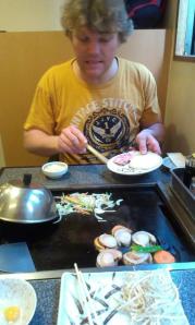 The unusual sight of Randall cooking.